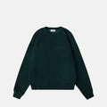 wholesome clothing pine green crewneck with an embroidered design by wholesome boy clothing